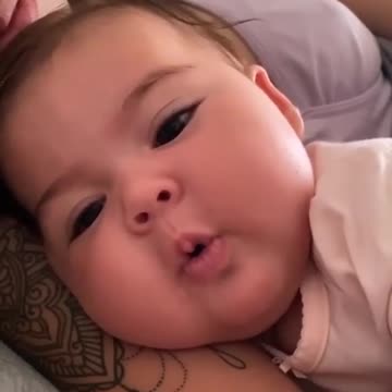 Sweet Baby Becomes Super Adorable For The Camera