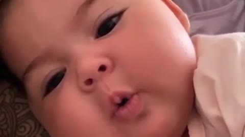 Sweet Baby Becomes Super Adorable For The Camera