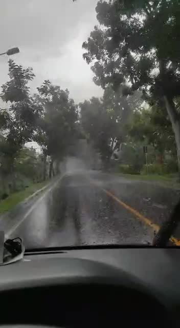 Driving a car in the rainy with my sport car