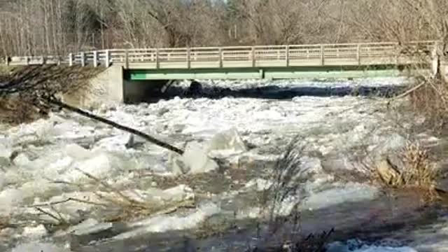 Ice Dam Breaks and Creates Torrential Water Flow