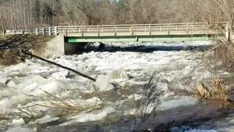 Ice Dam Breaks and Creates Torrential Water Flow