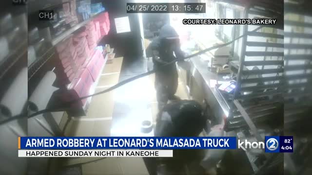 WATCH_ Robbers with gun inside malasada truck