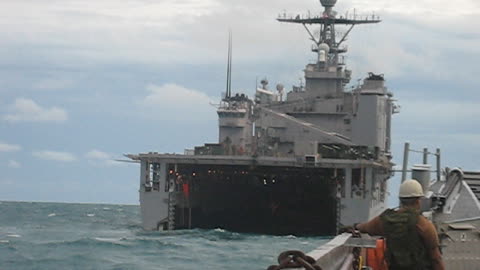 Riding the LCU to the stern of the USS HARPERS FERRY