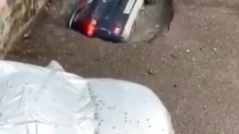 CAR FELL IN WELL
