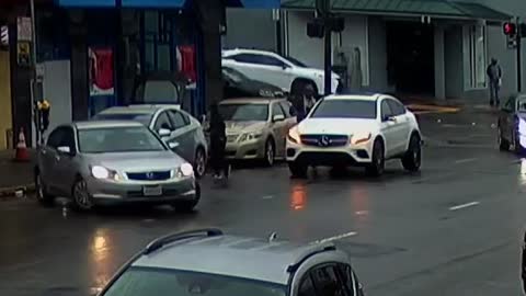 A man robs an Asian couple in San Francisco and then makes a getaway in a waiting Mercedes SUV