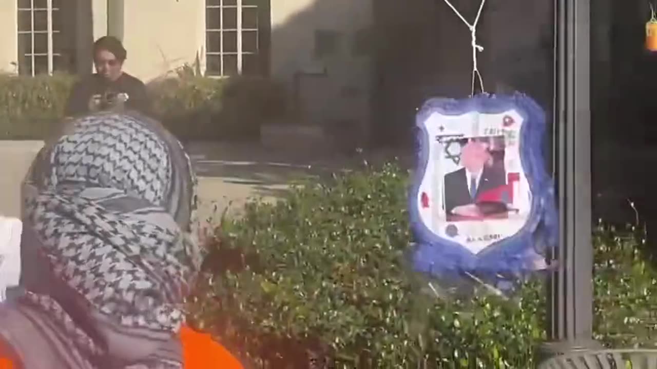 Students at University of California @ucla in Los Angeles taking out their anger at Israel on piñata