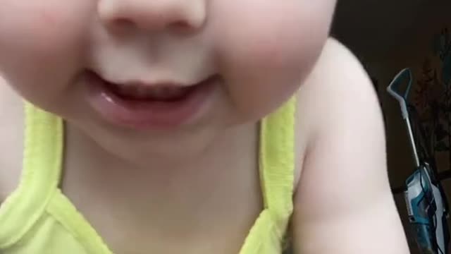 Turn on the video recording option on the mother's mobile, then see what the baby does