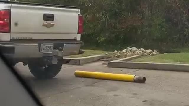 Truck in Taco Bell Drive-Through Takes Out Pole