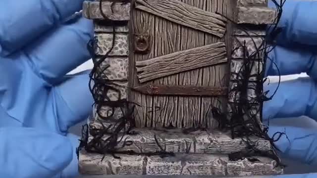 Sculpting and painting a dungeon door