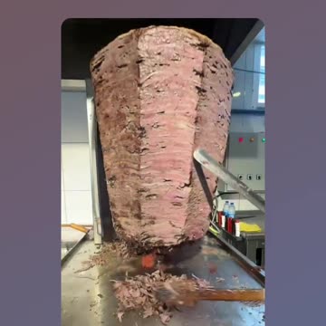 Cooks Assembling Spits for a Wonderful Greek Barbecue