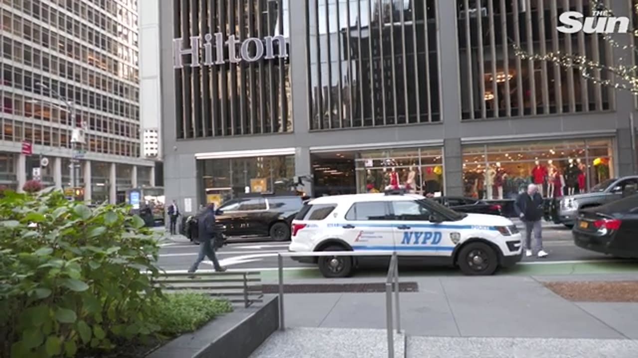 Moment Manhattan assassin shoots dead UnitedHealth CEO Brian Thompson outside Hilton