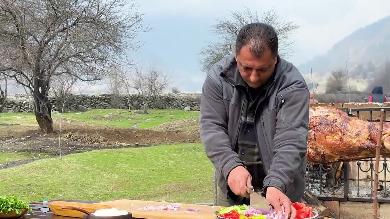 Roasting a Huge Bull on a Steel Spit!