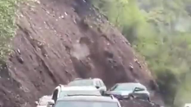 watch this unbelievable escape from a land sliding