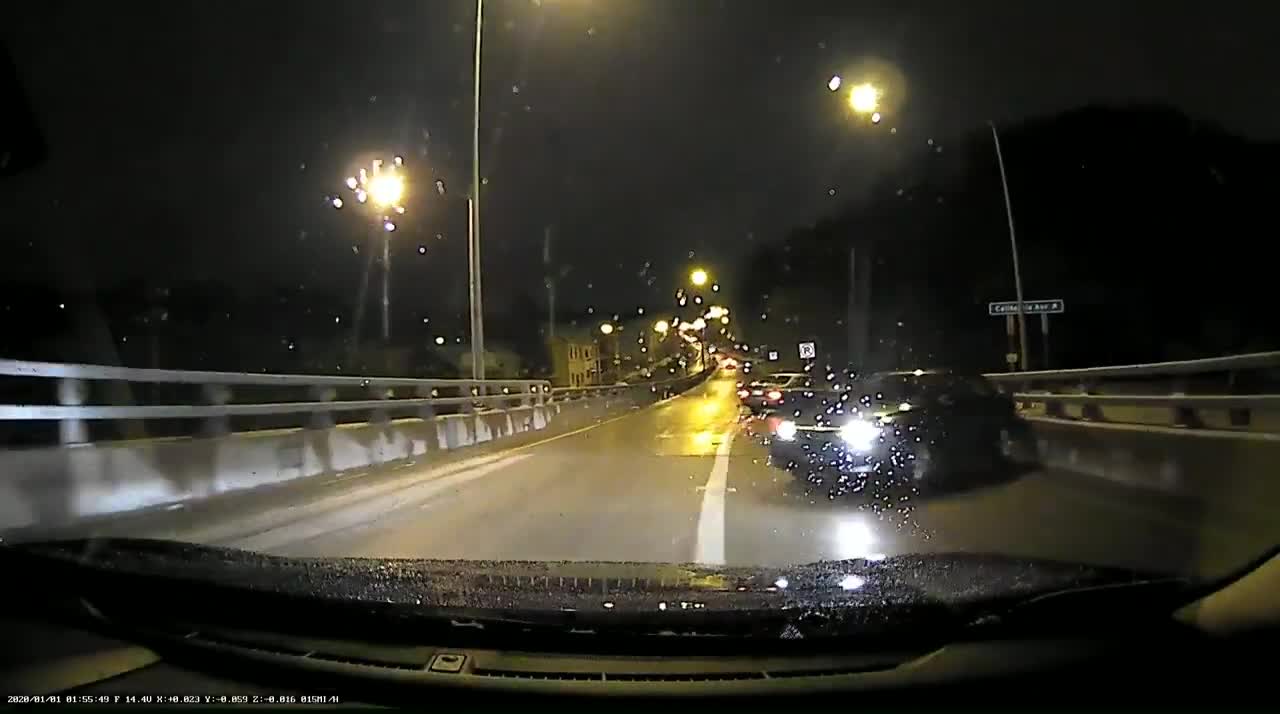 Driver Has a Scary Slide on Icy Bridge