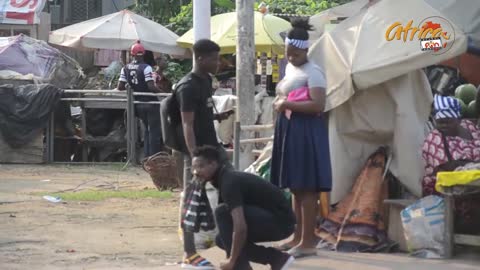 CAMEROON LOOKING IN THE STREET