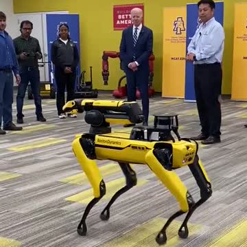 Biden inspects dog robot: "It's not to replace people."