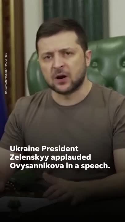 A woman interrupted a Russian television broadcast holding a sign that read no