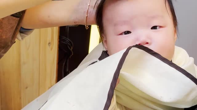 Baby first haircut