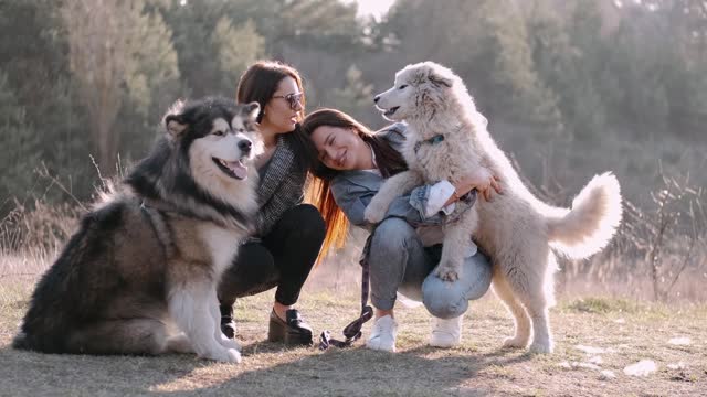 girls with cute dogs