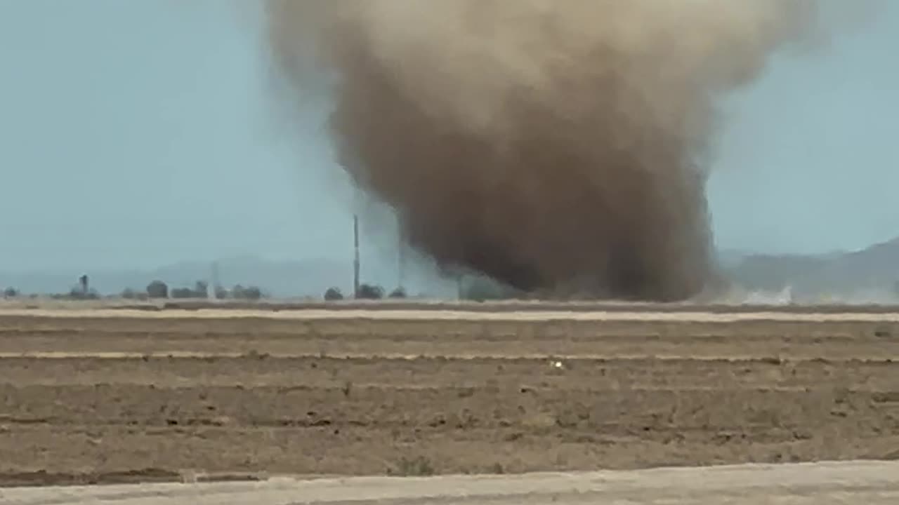 Driver Spots Huge Dust Devil in Field