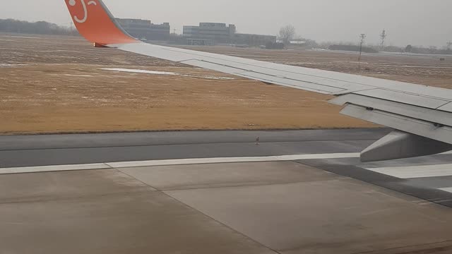 Airplane taxiing, take-off, in-flight from Incheon of Korea to Jeju Island of Korea