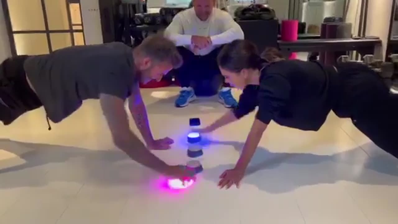 David Beckham himself takes on Victoria Beckham in a head-to-head #BlazePod plank challengewwww