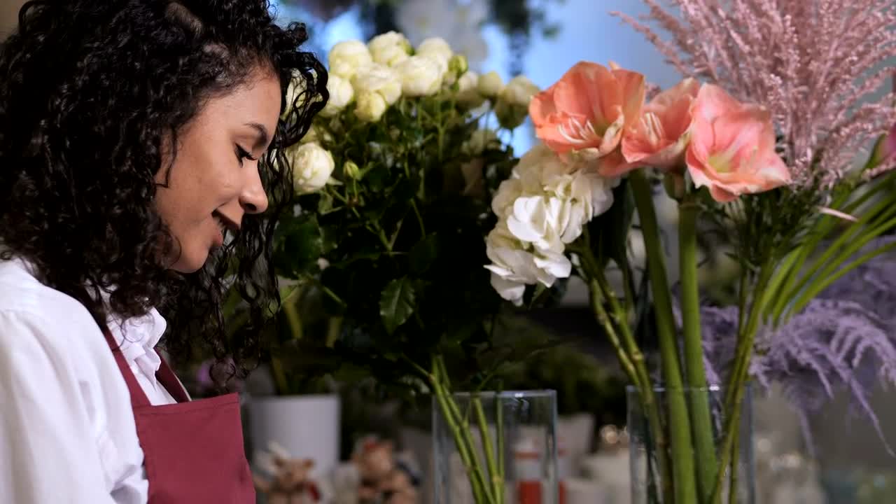 Female florist working from a tablet