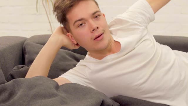 Man Falling From Sofa