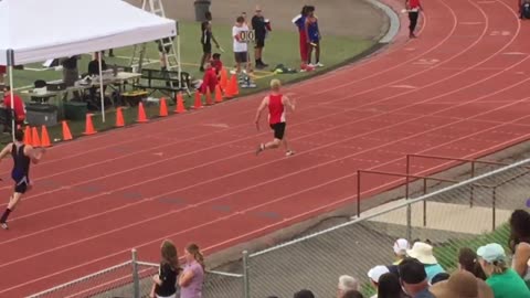 Red shirt blonde hair guy track trips