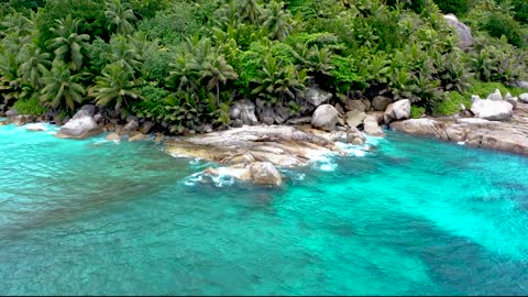 Beach With Clear Blue Water