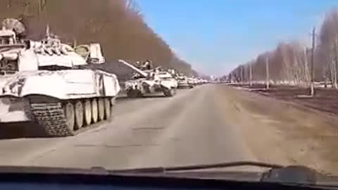 Column of 54+ T-80Us headed towards border town of Grayvoron