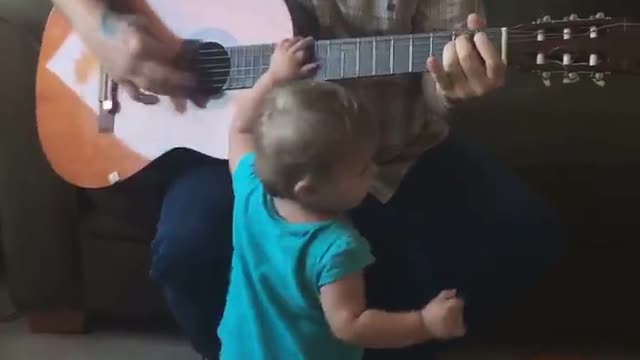 cute baby daddy guitar performance