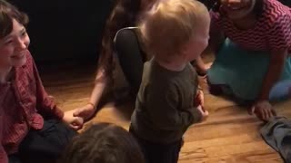 Toddler finds game of ring-around-the-rosy absolutely hysterical