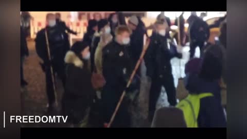 Moving the sheep along with their shepherd sticks