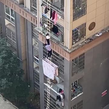 Chinese Have Had Enough Imprisonment - Climbing Down Sides Of Buildings To Get Out