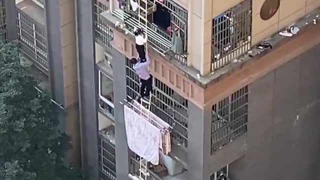 Chinese Have Had Enough Imprisonment - Climbing Down Sides Of Buildings To Get Out