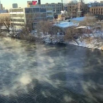 Current View of the Chicago River "Smoking" In Freezing Weather