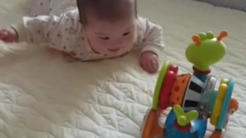 Baby looking at toys