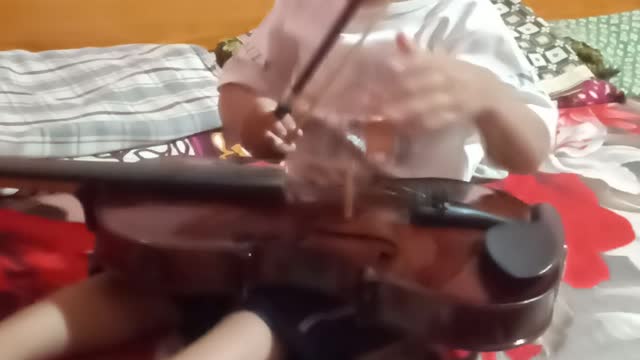 Cute kid Playing violin