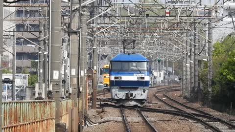 Freight locomotive rolling by