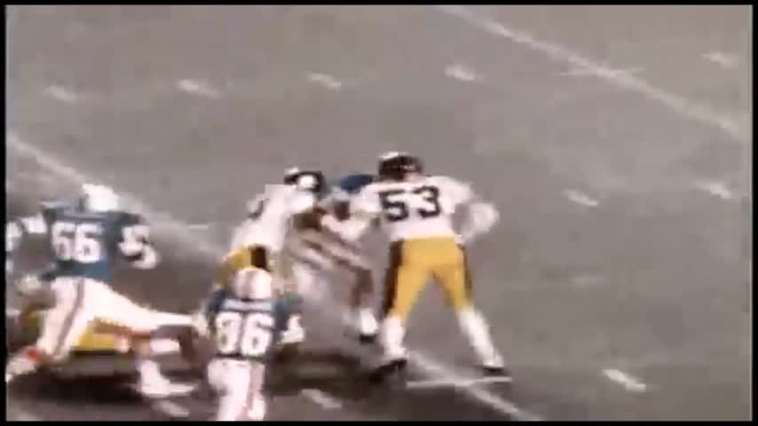 Larry Csonka runs over Pittsburgh safety Glen Edwards 1973