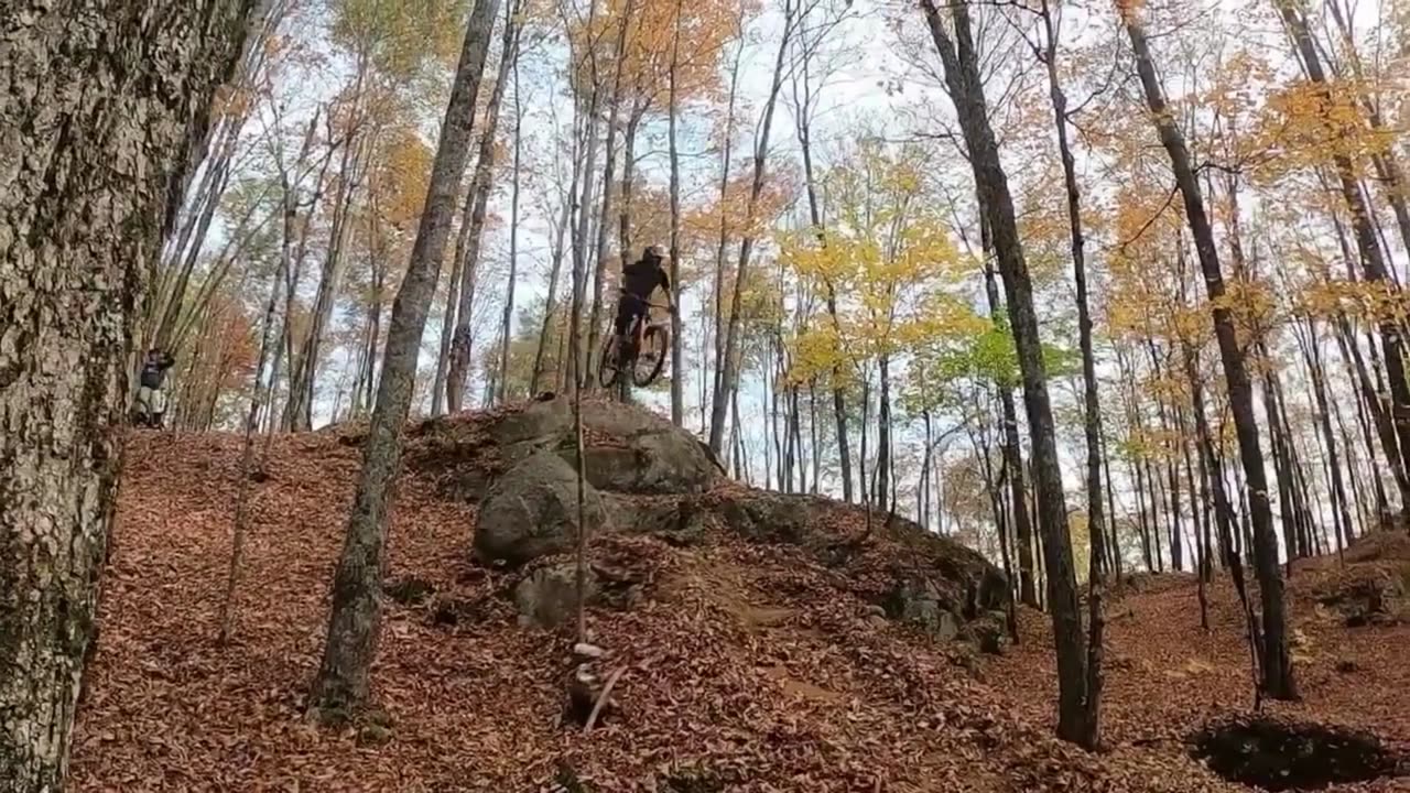 Bicyclist Takes a Tumble: Face-First Fall After Jumping Off Enormous Rock