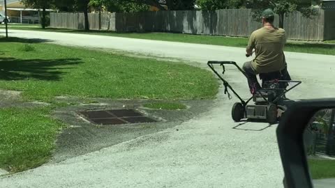 A Clever Way to Mow a Lawn on a Hot Day