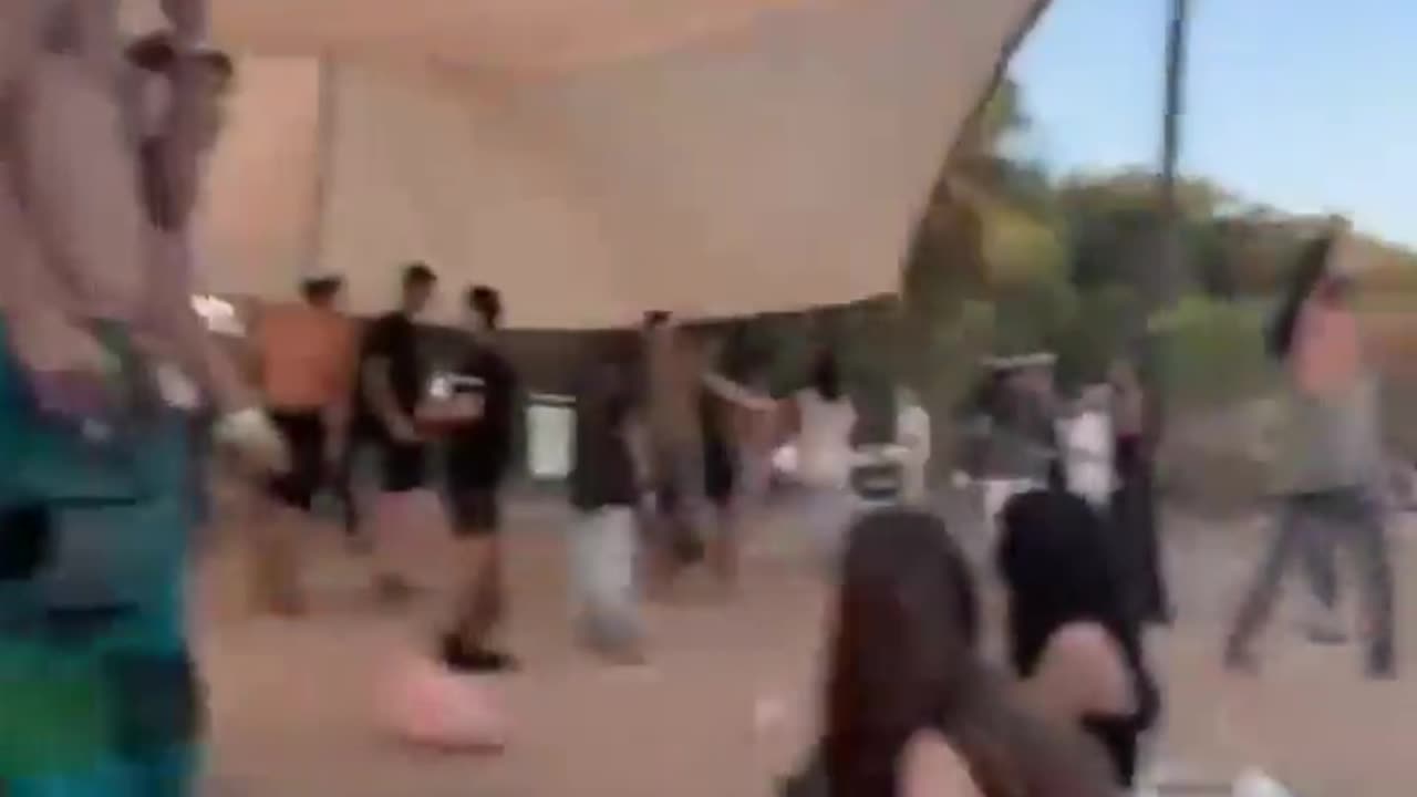 Hamas paraglider descended on music festival