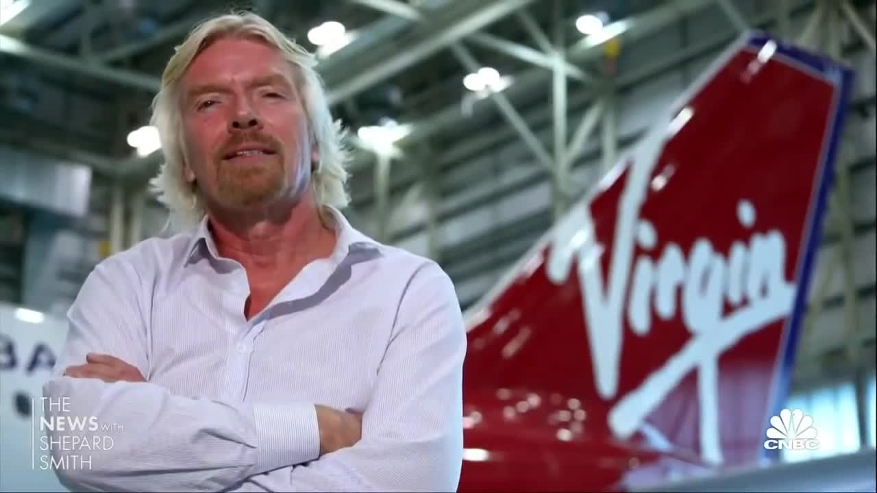 Virgin founder Sir Richard Branson readies for takeoff to space