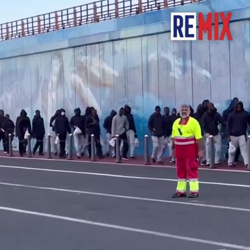 Immigrants transferred from Canary Islands to Puerto Los Cristianos in Tenerife to await flight...