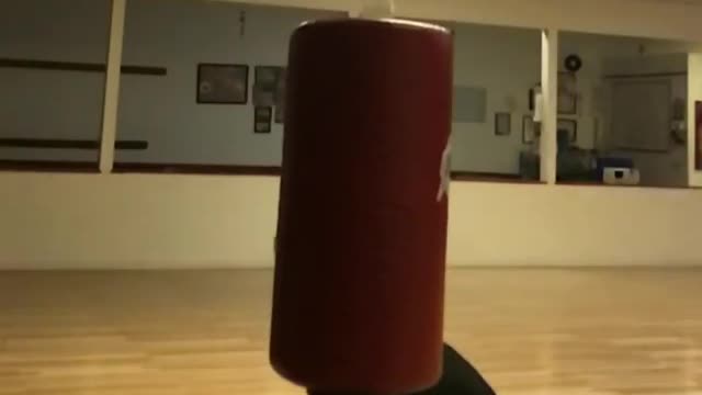 Collab copyright protection - guy red punching bag bottle kick