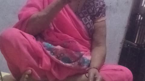 Village old lady doing lunch in own house