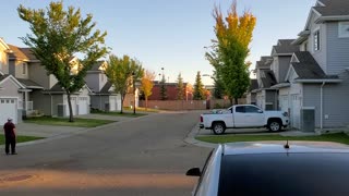 Kicking the ball with the next door neighbor