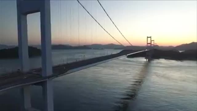 Drone Escape bridge in the sunset - ドローンエスケープ。 夕日の橋